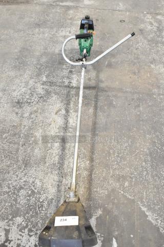 GTI 19T weed eater with green motor casing and metal shaft. Condition shows light wear. Label reads "234 QTY."