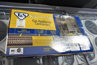 BRAND NEW T&S HG-4D-48K gas appliance connector hose, 48" yellow coated steel, FreeSpin fitting, installation kit, 3/4" NPT.