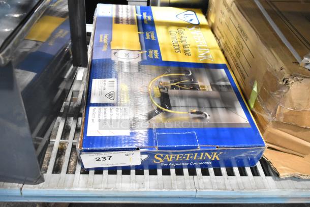 Brand new T&S HG-4D-48K Safe-T-Link 48" gas connector hose, yellow coated steel, 3/4" NPT, with FreeSpin fitting.