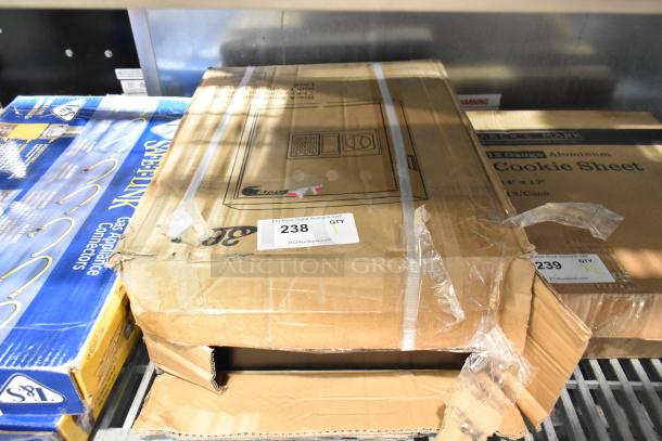 Brand new 360 Office Furniture key cabinet safe in damaged box. Black steel, wall mount, 71 key capacity, electronic keypad lock.