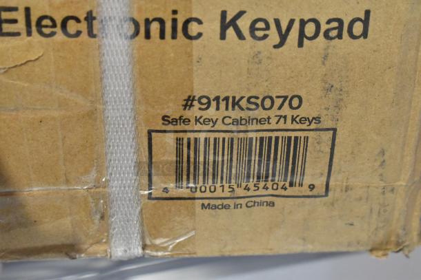 Brand new 360 Office Furniture black steel key cabinet, 71 keys, electronic keypad, minor box damage, model #911KS070.