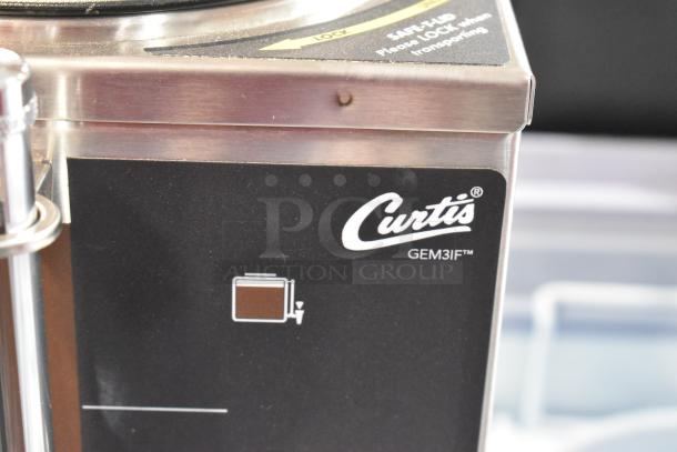 Brand new Curtis GEM3IF 1.5 Gallon Satellite Coffee Server with IntelliFresh, visible surface dent, stainless steel, model marking.