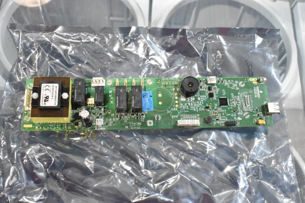 Amana Menumaster 14059194640 control board, brand new, on a static shield bag. Tags show component details.