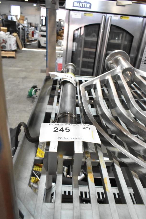 Brand new Cleveland KE000523 Hydraulic Jack Assembly for TR/F skillets with label indicating auction lot 245. Slight dents visible.