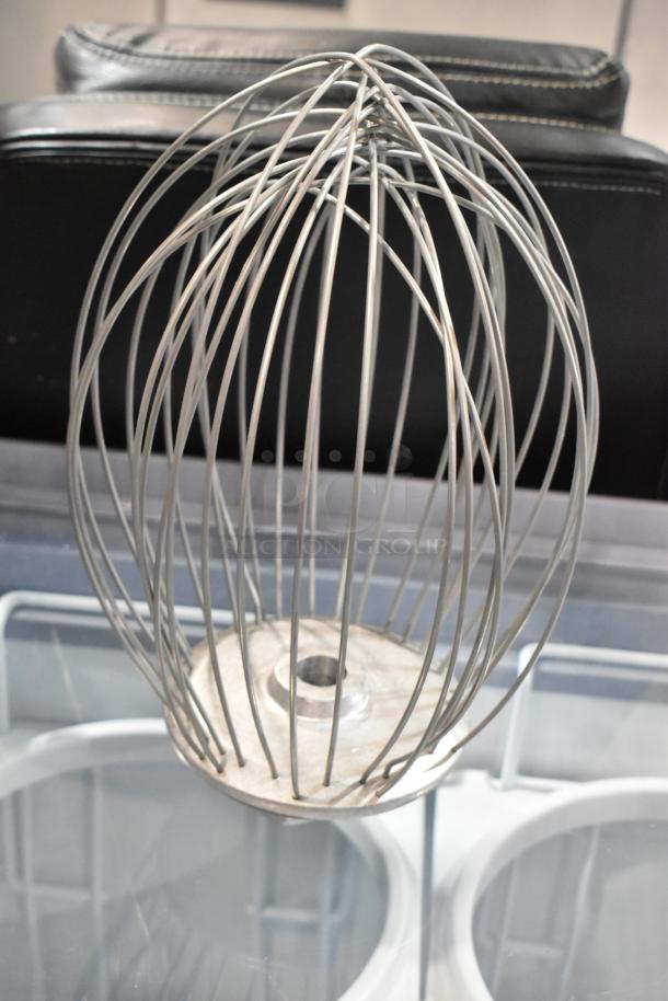 Stainless steel whisk attachment, brand new with minor scratches. Durable design for mixer compatibility.