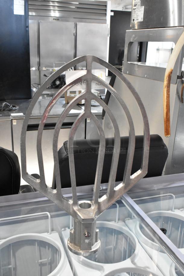 Three new kitchen attachments: a paddle, whisk, and long-handled whisk. Slightly scratched. Great for mixing tasks.