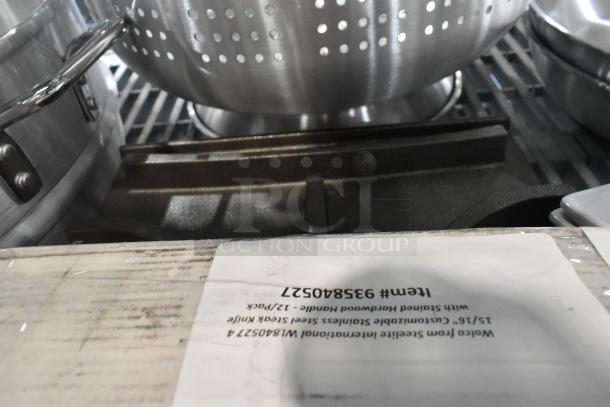 10 new scratch and dent kitchen items including Town 22" aluminum steamer, Walco steak knives, and Robot Coupe "S" blade.