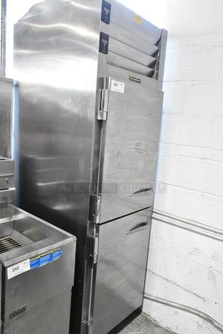 Traulsen ADT132KUT-HHS stainless steel commercial reach-in cooler/freezer, two half-size doors, on casters, 115V, 1 phase, used.