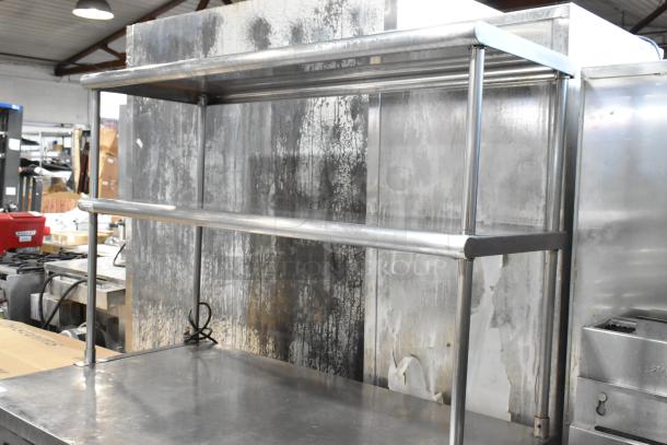 True TUC-48 stainless steel 2-door work top cooler with 2 overshelves, on commercial casters. Model TUC-48, 115 volts, 1 phase.