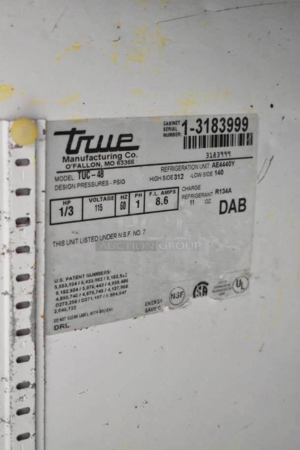 True TUC-48 Stainless Steel Work Top Cooler label showing model, voltage, and design pressure. Serial no: 1-3183999.