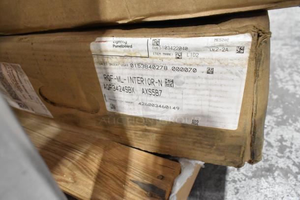 9 new scratch and dent items, including i2Systems 221900 LED strips. Labels show item codes and production details.