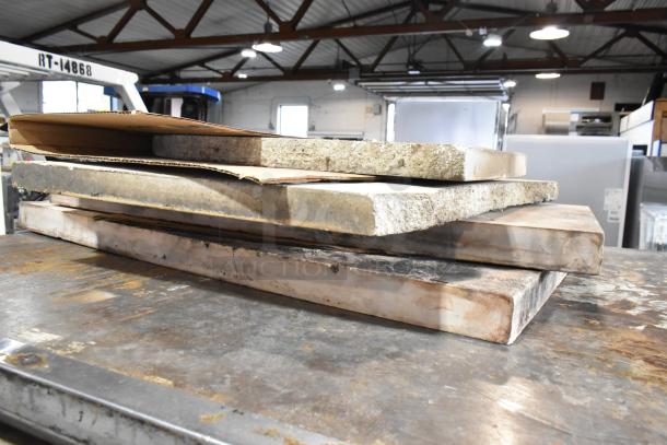 Stainless steel pizza oven cooking stones for Bakers Pride gas-powered single deck ovens, showing minor wear.