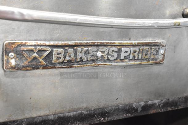 Bakers Pride stainless steel commercial gas pizza oven with cooking stones, features brand plate, slightly worn condition.