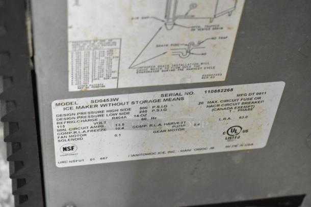 Manitowoc SD0453W stainless steel commercial ice head label, showing model specs, 115 volts, 1 phase, UL listed.