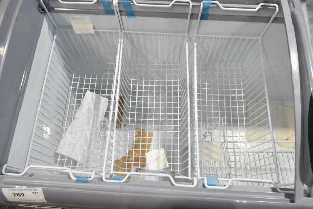 Brand new Avantco 360DFC20HCL ice cream freezer. Curved top, customizable display, includes baskets, commercial casters. 115V, 1 Phase.