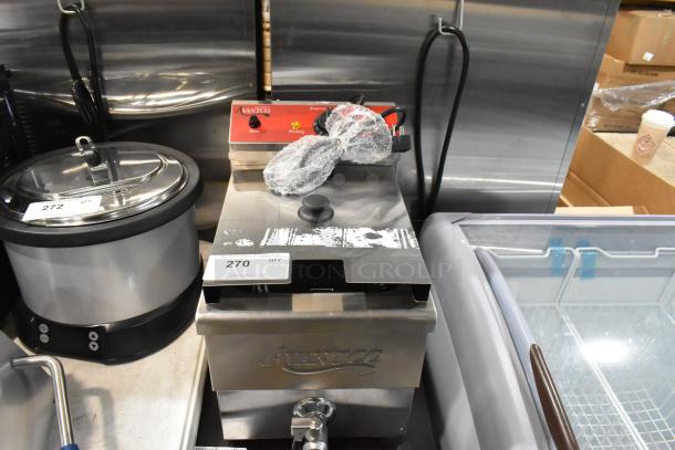 Brand new 2024 Avantco 177F200 stainless steel electric fryer, 15 lb. capacity, includes metal basket and lid, 208-240 volts.