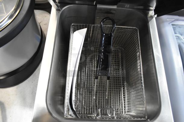 Avantco 177F200 stainless steel countertop fryer, 15 lb. capacity, metal fry basket, lid, 208-240V, brand new, minor scratches.