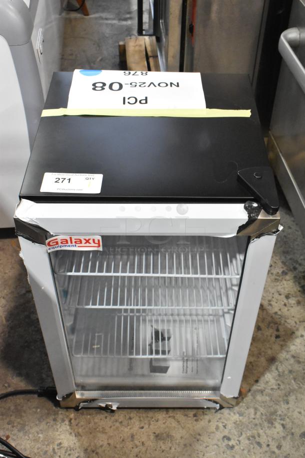 Brand new Galaxy 177CRG3B black customizable countertop display refrigerated merchandiser, 2.5 cu ft, with minor dents.