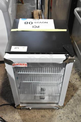 Brand new Galaxy 177CRG3B black customizable countertop display refrigerated merchandiser, 2.5 cu ft, with minor dents.