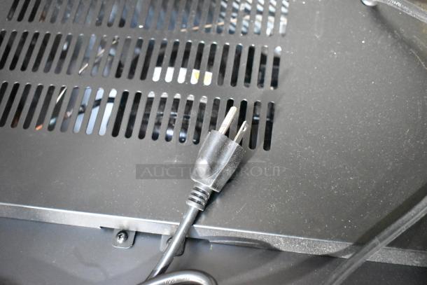 Black power cord and vented panel on Galaxy 177CRG3B refrigerated merchandiser. Brand new, scratch and dent. 115V, 1 phase.