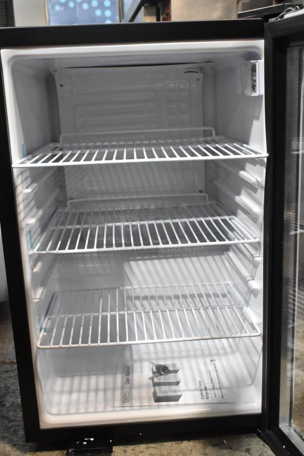 Brand new Galaxy 177CRG3B black customizable countertop display refrigerated merchandiser, 2.5 cu ft, 115V. Minor scratches.