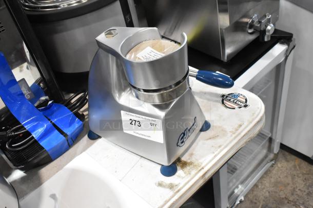Brand new Edlund metal commercial countertop patty former with slight scratches and dents. Model features blue handle.