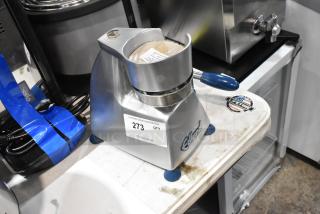 Brand new Edlund metal commercial countertop patty former with slight scratches and dents. Model features blue handle.