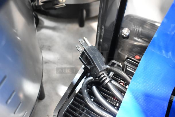 Carnival King JETCOF 120M beverage dispenser, 120V, shows a power cord. Identified as scratch and dent, brand new item.