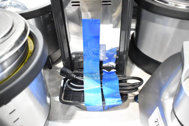 Brand new Carnival King JETCOF 120M refrigerated beverage dispenser, 5-gallon bowl, 120 volts, minor scratches, taped cord.