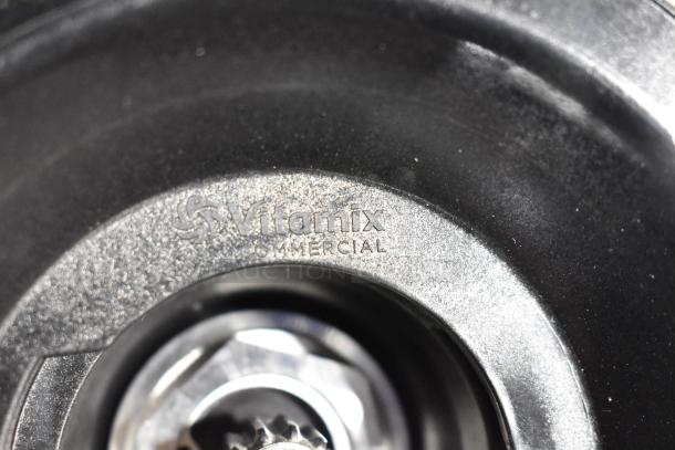 BRAND NEW VitaMix VM0246 immersion blender blade, commercial grade. Visible scratch and dent. Blade close-up, logo shown.