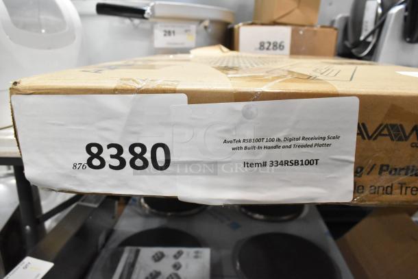 Brand new AvaTek RSB100T 100 lb. digital receiving scale box, features built-in handle and treaded platter, slight scratch.