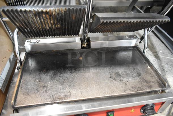 Brand new Avantco 177PG400GS dual panini grill, grooved top and smooth bottom, 19 5/8" x 9 1/8" surface, 120V.