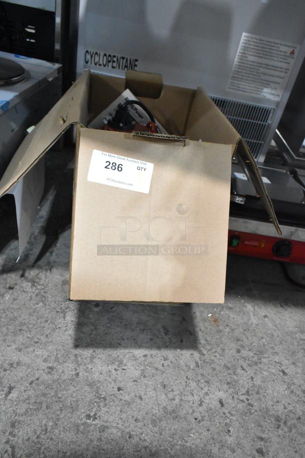 Liberty Pumps LE51A 1/2 hp sewage pump in open box, new condition, with label indicating "Scratch and Dent" status.