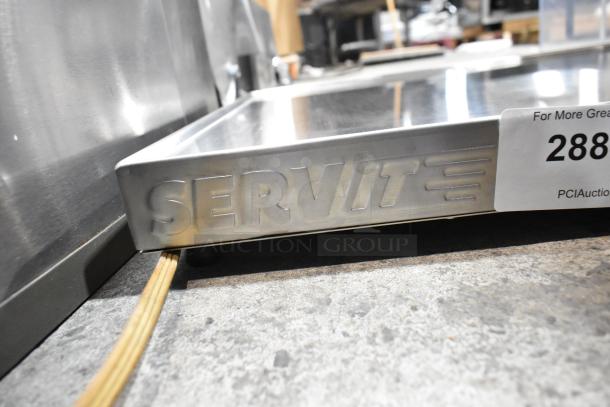 Brand new ServIt 423HSW2024 stainless steel heated shelf warmer, 24" with slight cosmetic flaws. 120 volts, 1 phase.