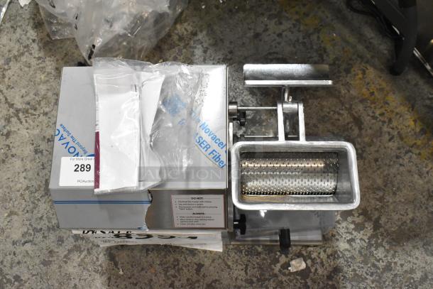 Estella 348CG2 stainless steel hard cheese grater, new with scratches, 4 lb/min, 120V, 1 phase, labeled "289".