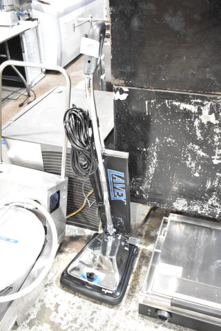 Brand new Lavex P101 commercial vacuum cleaner with scratch and dent, 120 volts, 1 phase. Handle wrapped cord, chrome finish.