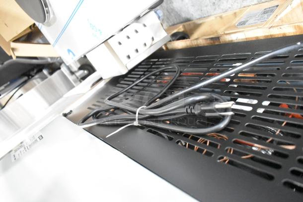 Brand new Avantco 178A19FHC single door commercial freezer, stainless steel, poly-coated racks, 115V, 1 phase.