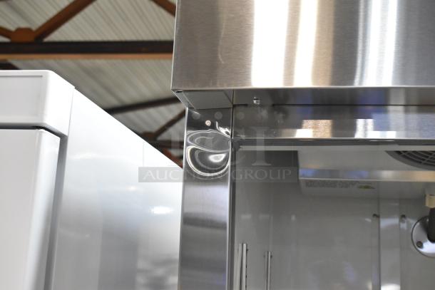 Brand new Avantco 178A19FHC stainless steel commercial freezer with scratches, single door, poly-coated racks, 115V, 1 Phase.