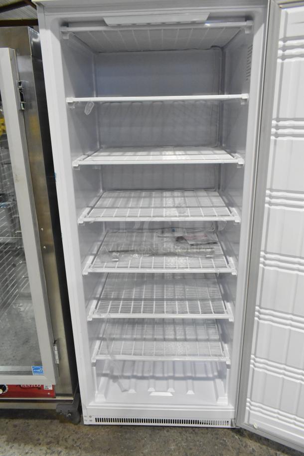 Brand new KoolMore KM-FMD20WH 21 Cu. ft. commercial reach-in freezer in white, manual defrost, 115 volts, 1 phase.