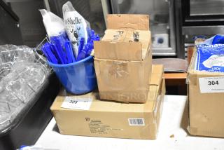 Three brand new items, including Steelite 049492 dinner knives and sea shell shellfish openers, in original boxes.