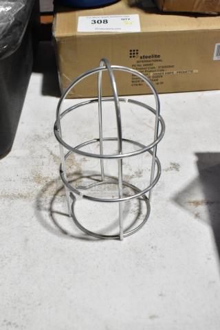 Lot of 14 new scratch and dent items, includes metal hood light cover, boxed setup visible in black poly bus bin.