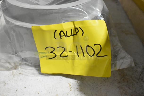 Two new scratch and dent ALP 32-1102 scrap blocks with yellow label, model number visible.