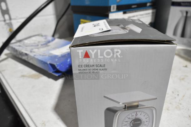 Brand new Taylor Professional Ice Cream Scale in damaged box. Slight dents visible, pristine condition inside.