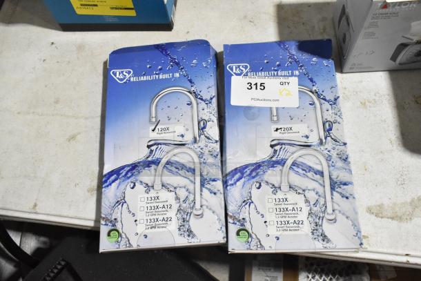 Two brand new T&S 120X Gooseneck Faucets, scratch and dent condition, on packaging with water splash design.