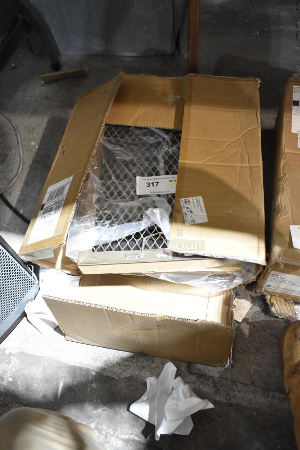 Three new scratch and dent metal filters in original packaging, tags indicating auction lot number 317.