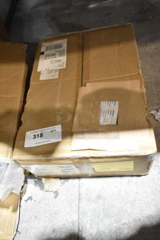Cardboard boxes labeled for auction with visible shipping and auction tags; minor dents and scratches present.