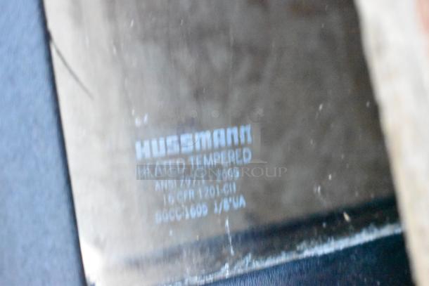 Heated tempered glass door by Hussmann, marked ANSI Z97.1-2009, made in USA. 5 doors available per bid.