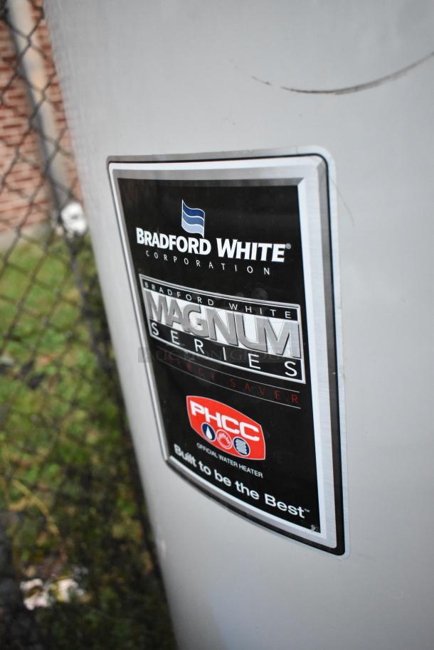 Bradford White tank from Magnum Series, PHCC label, energy saver, shown outdoors.