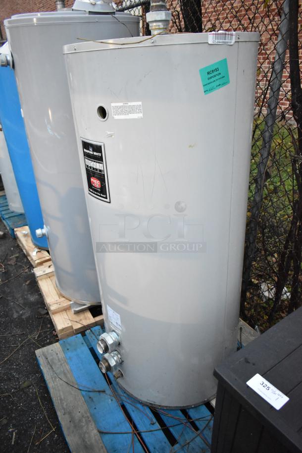 Four tanks, including three Bradford White with visible labels, and Glacier Opti-stor Heat Recovery System, used condition.