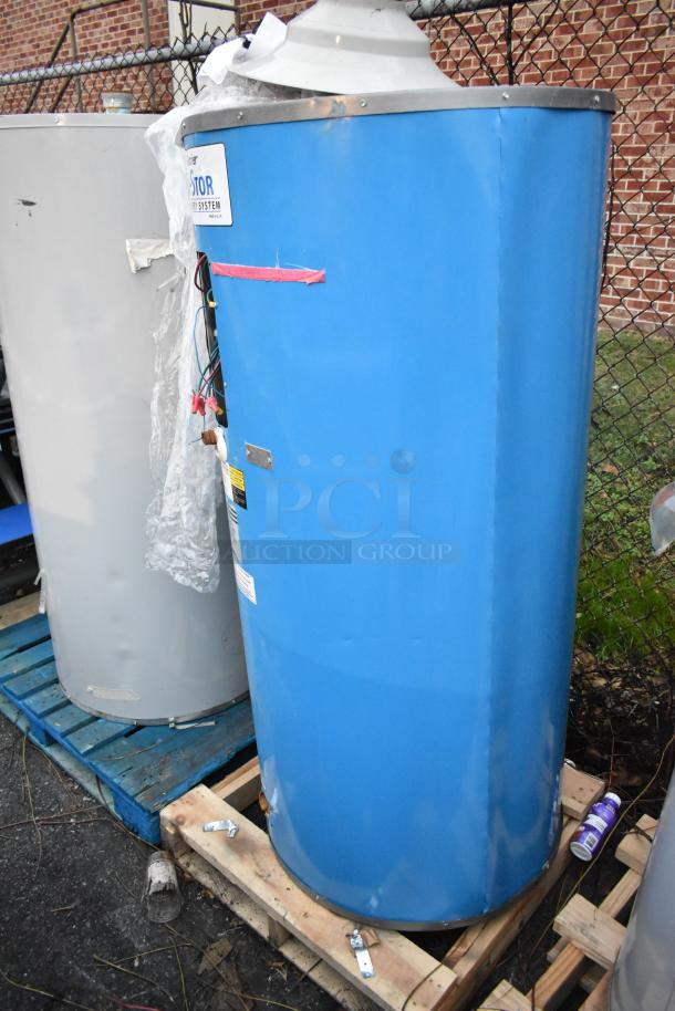 Four various tanks including three Bradford White tanks and a Glacier Opti-stor heat recovery system on pallets. Good condition.